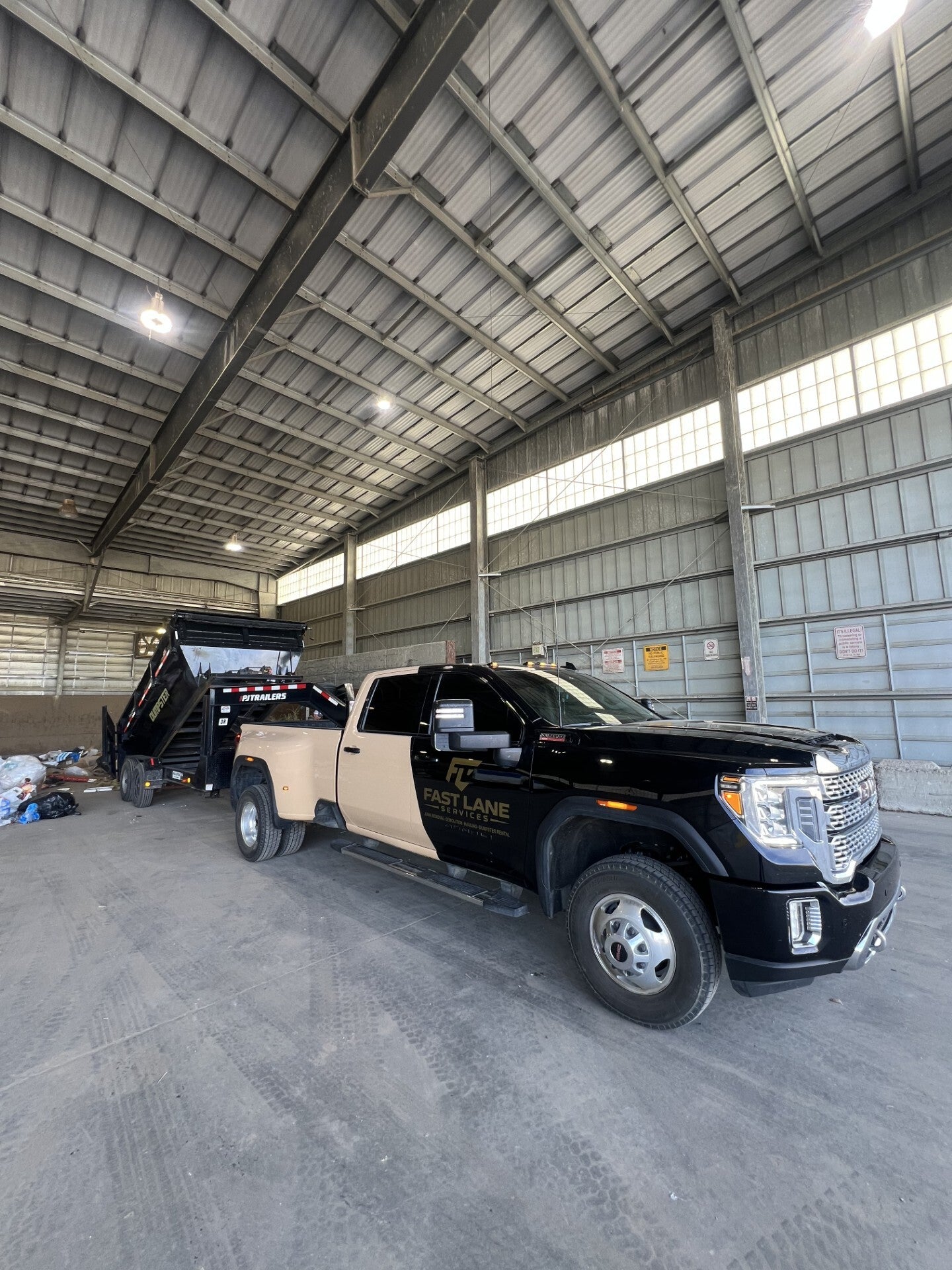 Fast Lane Services crew loading a truck during a junk removal job